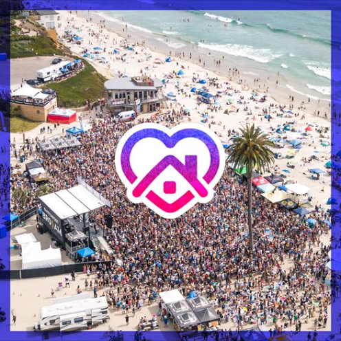 Arial image of a large crowd of people at the beach for the BRO-AM event,